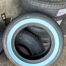 WIDE WHITE WALL TIRES. 14 INCH. AND 15. INCH
