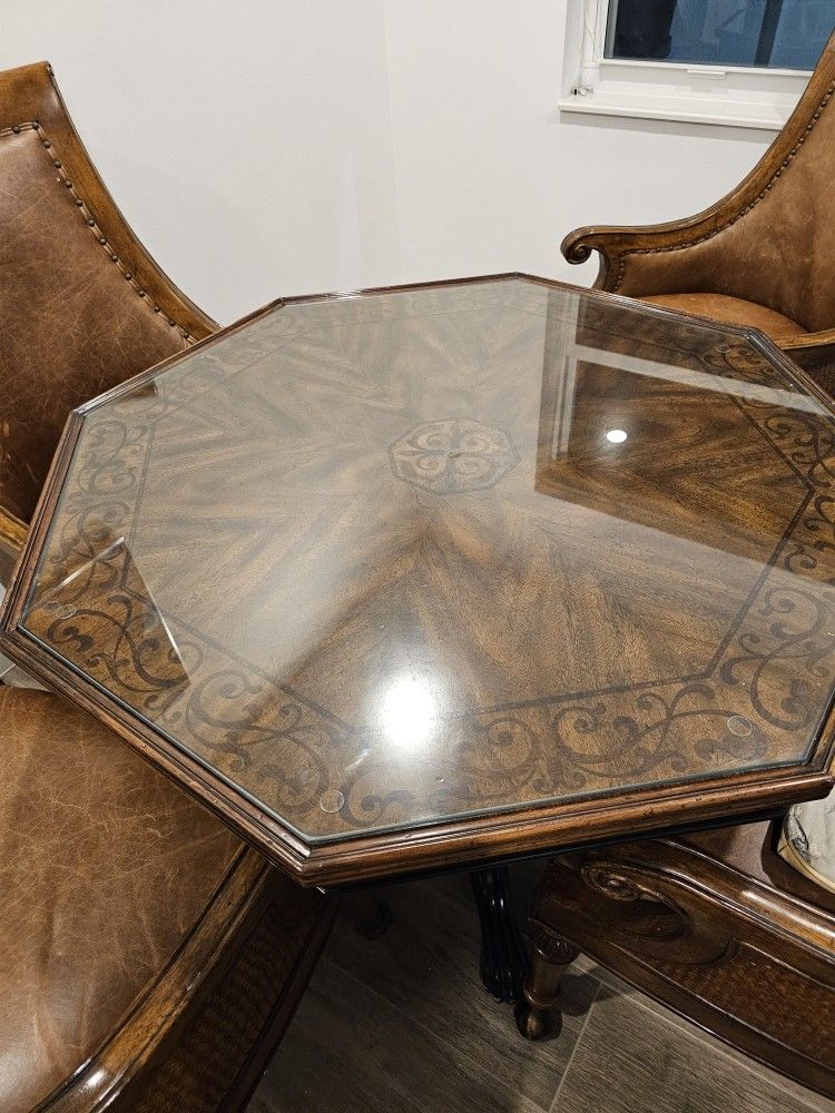Octagon Real Wood Dining Room Table With 4 Leather Chairs With Wheels.