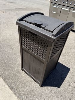 Suncast 33-gallon resin trash hideaway patio container.