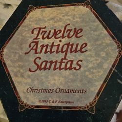12 SANTAS  ORNAMENTS.. IN ORIGINAL BOX
