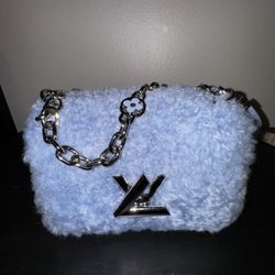 Louis Vuitton Blue Shearling Twist Handbag