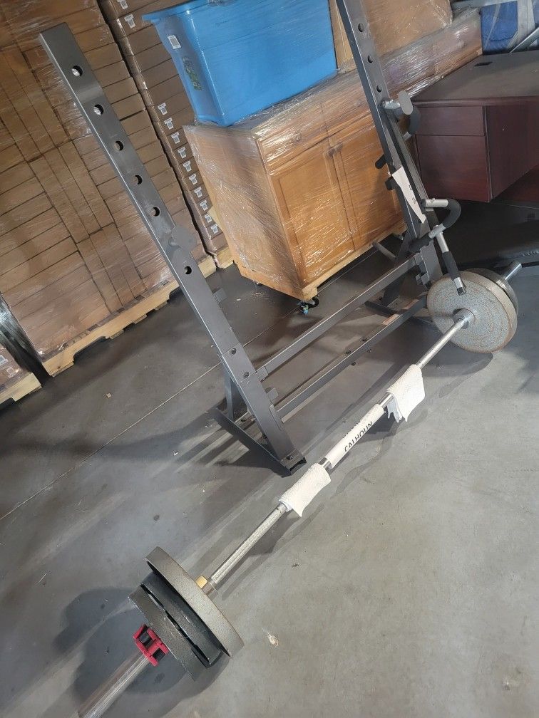Bench Press with Olympic Bar + weight plates $220 - Obo