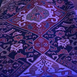 Hand-knotted Caucasian Kazak Rug — 100% wool, vegetable dyed — geometric tribal design in navy, red, ivory & olive tones.