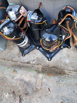 Ac unit compressors