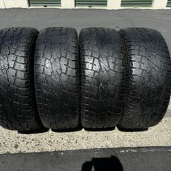 (4) 295/60R20 Pro Comp Sport A/T