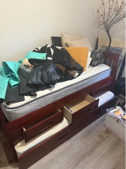 cherry-finished wooden daybed
