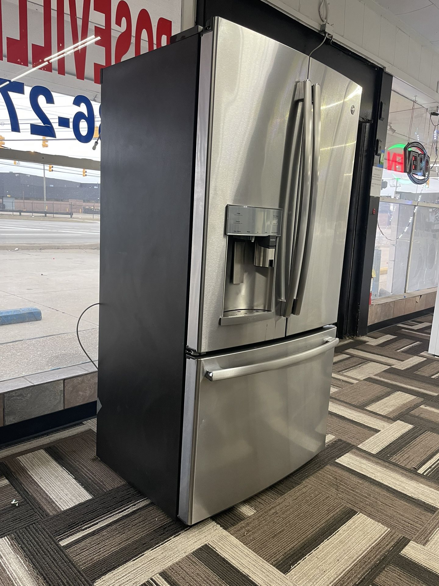 Stainless steel counter depth GE profile café with built-in Keurig French door, 📍 Roseville Appliances 