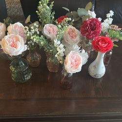 Assorted Floral Arrangements In Vases