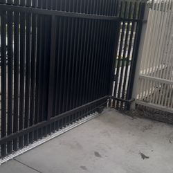 Modern vertical slat gate