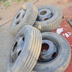 Set of 19.5 tires w/ adapters from 2013 Chevy Silverado 2500HD 8 Lug