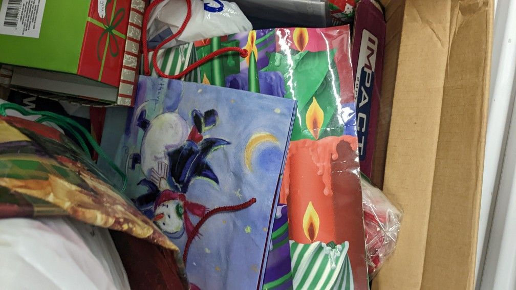 LARGE SELECTION OF HOLIDAY SHOPPING BAGS, CHRISTMAS AND NICE BOXES, BELIEVE WRAPPING TISSUE AND WHAT YOU SEE AND EVEN NOT THERE IN LOT!!! 