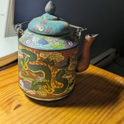 antique Chinese cloisonné teapot with a dragon motif