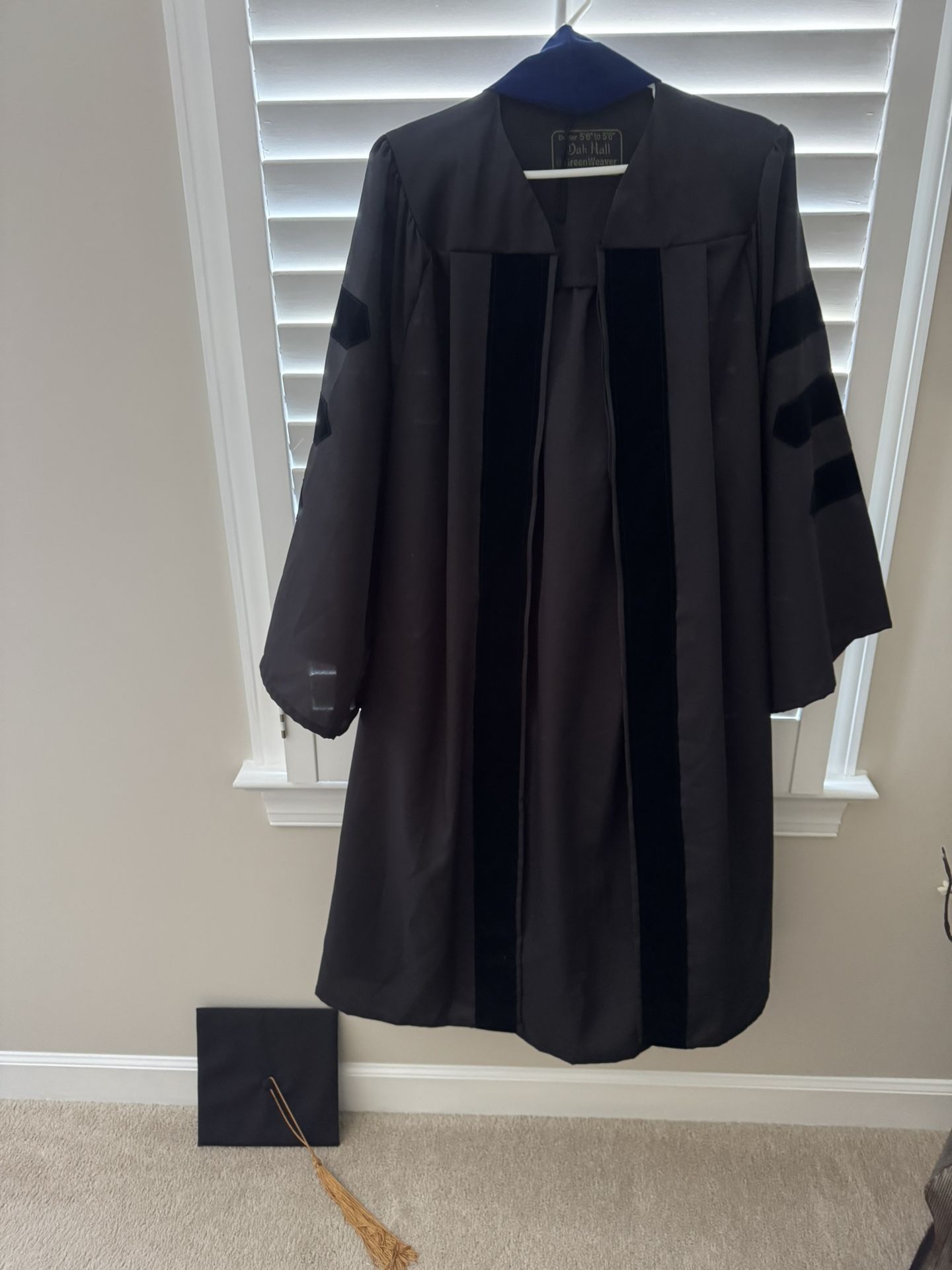 NC State doctoral graduation cap and gown