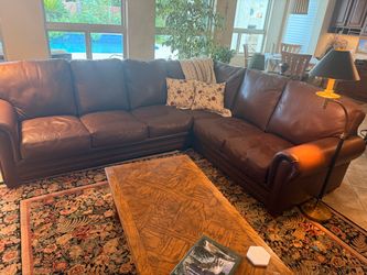 Creative leather sectional butter soft leather pristine condition