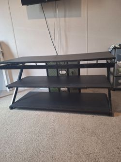 Tv stand/entertainment center
