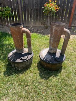 Selling two Vintage smudge Pots both still in good condition. One has a pinhole but could be patched asking $125 each.