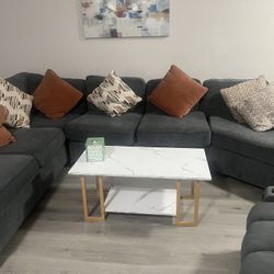 Blue Sectional, Some Wear Spots, Non Smoking With Matching Rug, 6 Pillows, And Blue Curtains 