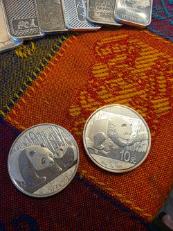 2 silver panda s 1 is a 2011 1oz and 2016 30 gram