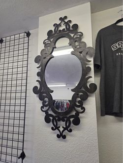 Elevate that whimsigoth space with this beautiful large alternative style metal mirror,