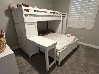 White full size loft bunk bed with desk and storage