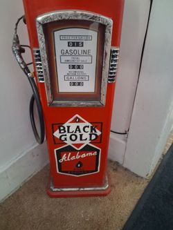 Wooden gas pump with little shelves