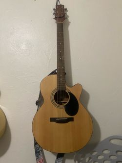 Jasmine acoustic guitar