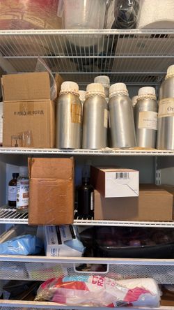 Essential oils and measuring utensils for sale.