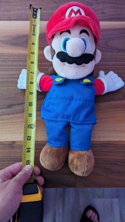 SUPER NINTENDO WORLD Medium Mario Plush $30
