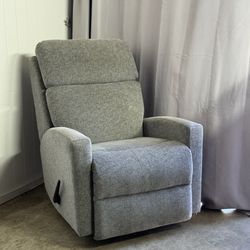 Like new swivel rocking recliner / nursery armchair