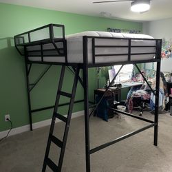 Black Metal Full-size Loft Bed With Ladder, Storage Shelf, And Large Under-bed Space. New and Unused. Partially Assembled