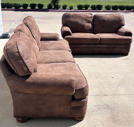 Brown sofa and loveseat set