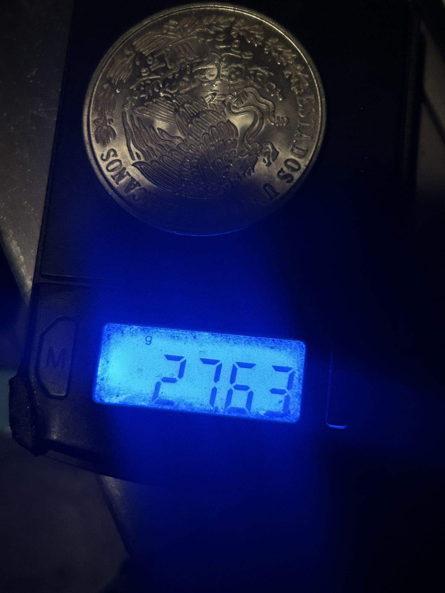 one Cinco pesos two of them are 1977 and one of them is 1979BU