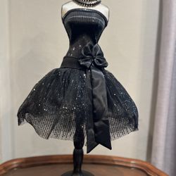 Black sequin corset top with lace up back and bow detail decoration or jewelry holder