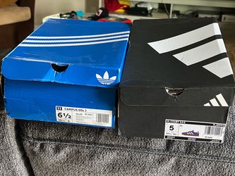 Two pairs of Adidas women sneakers