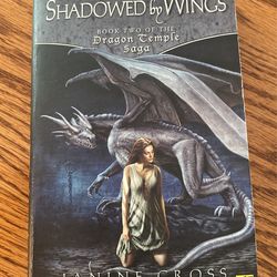 SHADOWED BY WINGS