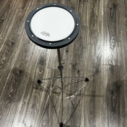 DRUMMING PRACTICE PAD AND PRACTICE PAD STAND