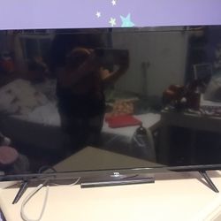 Broken TCL Roku TV - Black With Cables And Remote Control