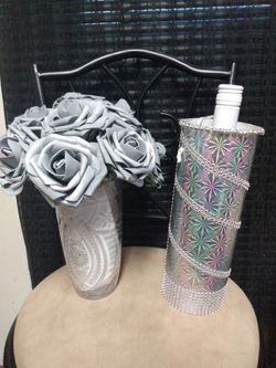 $45 very beautiful Silver/ Gray roses Includes: Silver rhinestones Wine carrying gift box. Solon, Maple, Garfield, Bedford, University Circle.