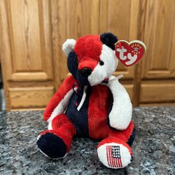 Ty Beanie “Patriot ”  The Bear 2000 Retired Plush Toy.  Brand new with tags.  Had been on display with a Ty Beanie Babie Collection.  