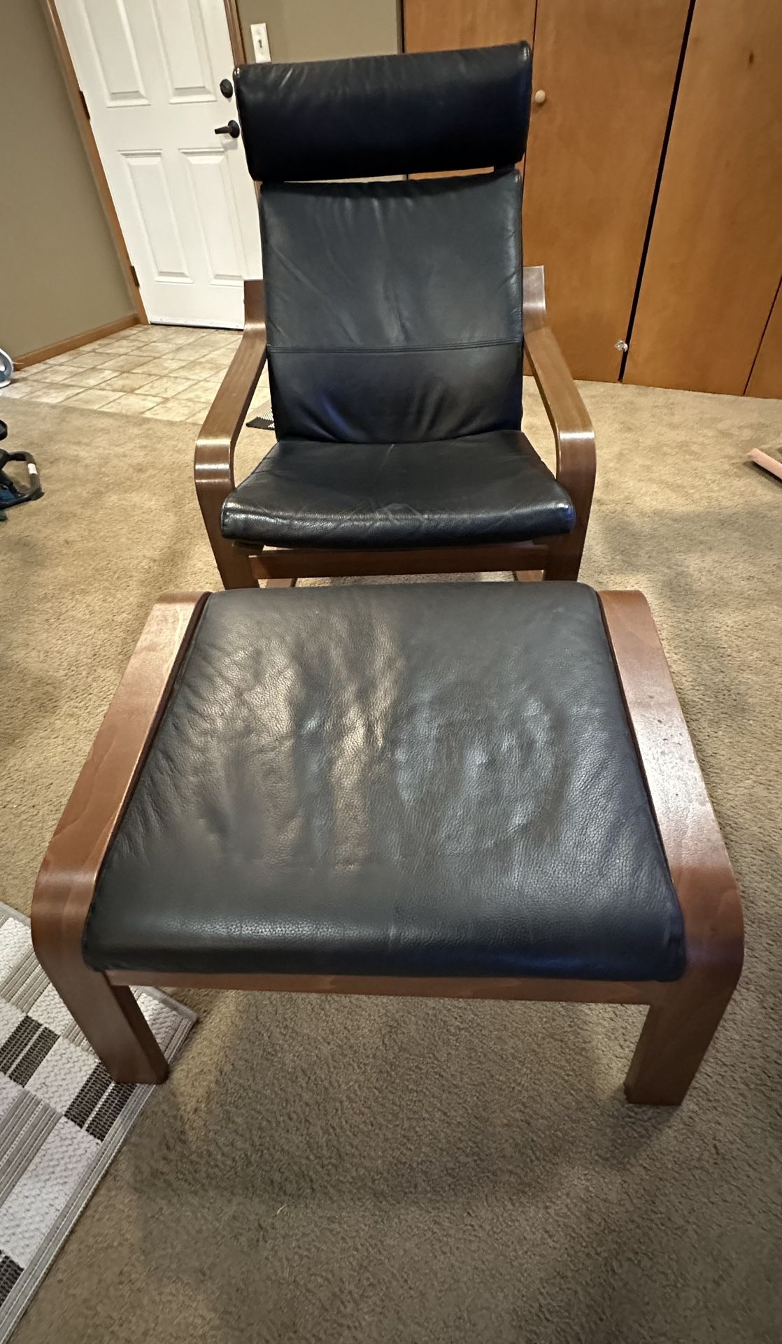 Black Leather Lounge Chair With Foot Stool
