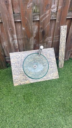 Granite Vanity Top with Glass Vessel Sink and Faucet