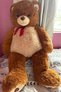 Large Plush Teddy Bear with Red Bow