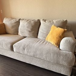Ashley Home Furniture Beige Sofa