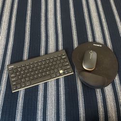 Wireless mouse, mouse pad and keyboard