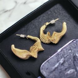 Stainless steel gold plated spiral winding knot earrings