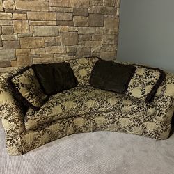 Elegant curved sofa & ottoman and - statement piece