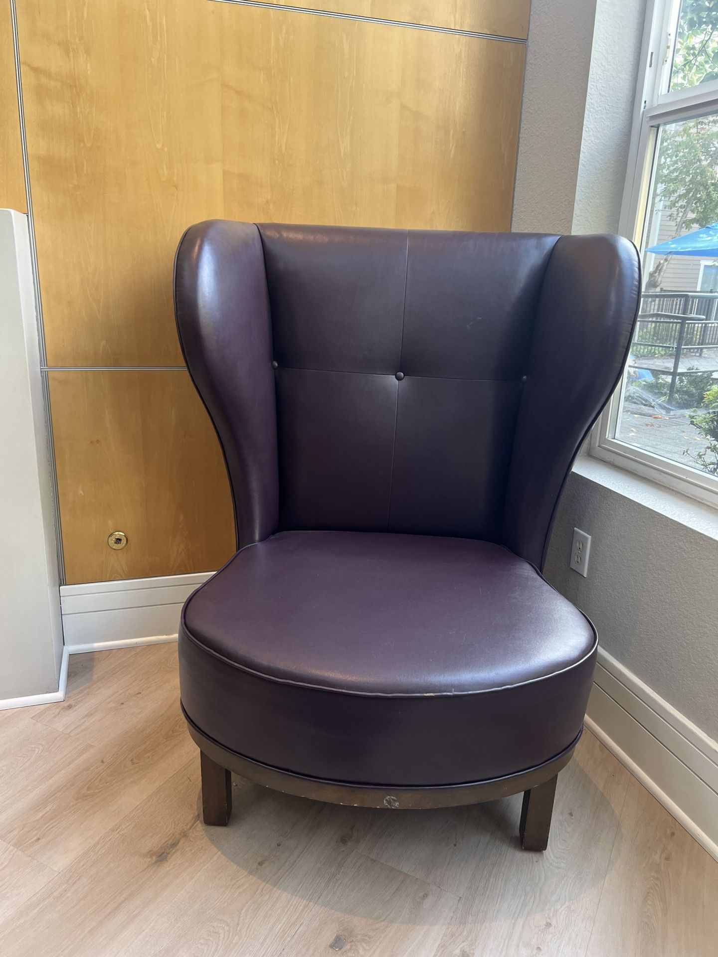 Two Large Leather Wingback chairs