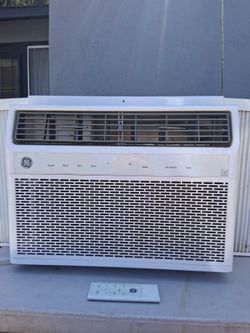 GE air conditioner 14,300 BTUs with remote