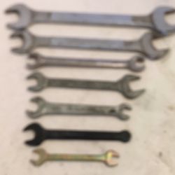 7 Assortment of wrenches open ended- (9/16, 15/16, 14-Toyota, and others)