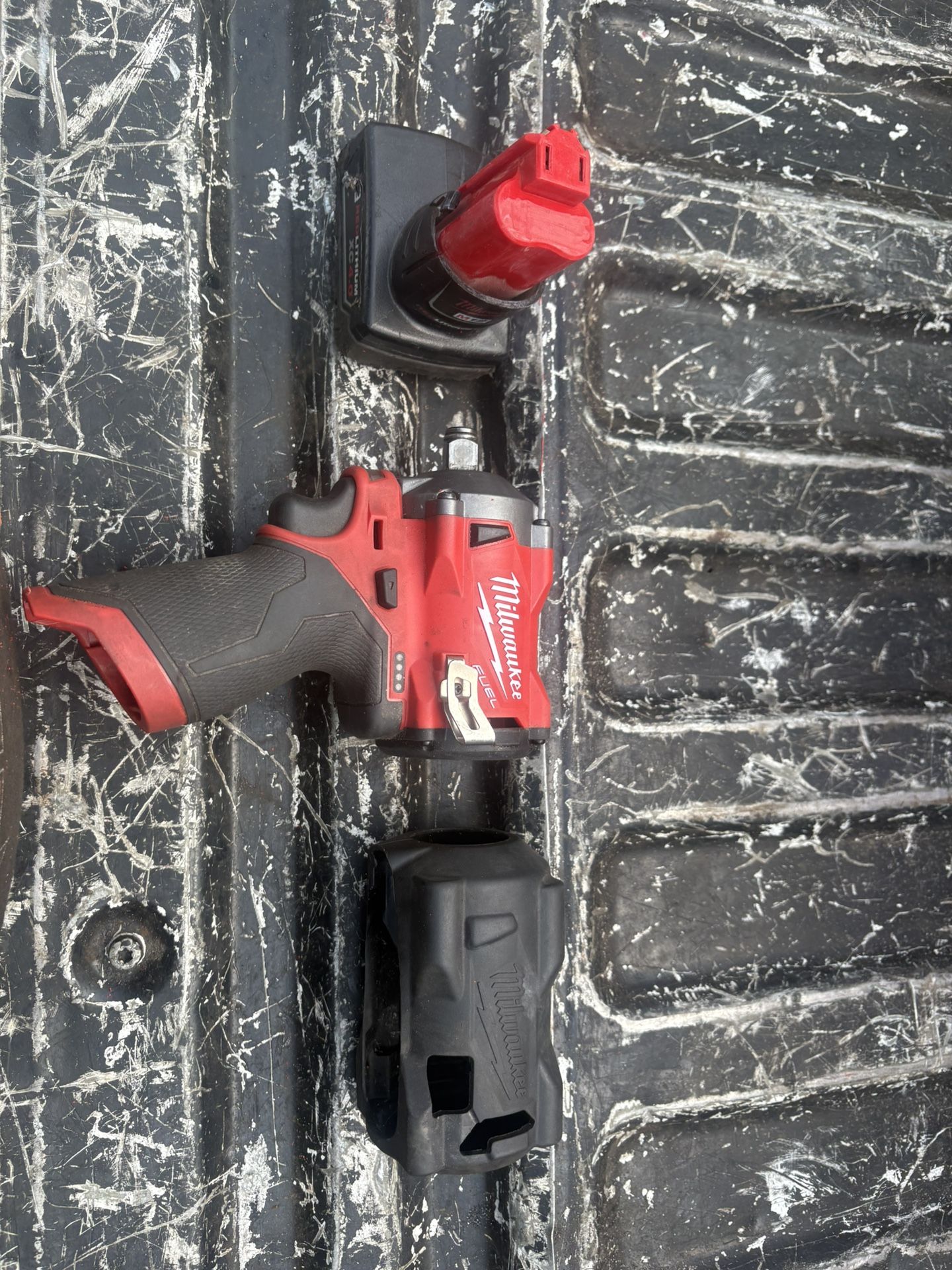 Milwaukee M12 Fuel Stubby 1/2” Impact W/ 4 XO Battery